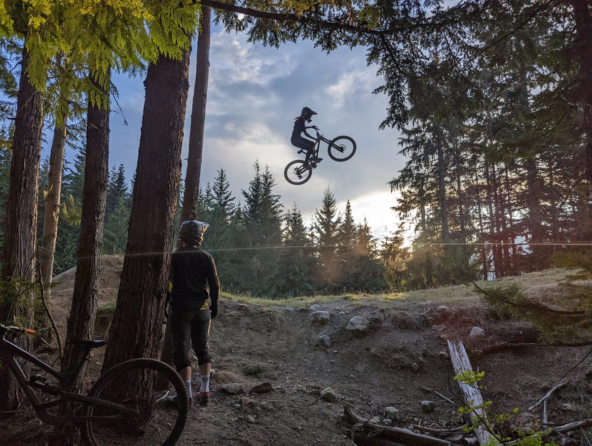 Mountain biker catching air at Whistler Bike Park