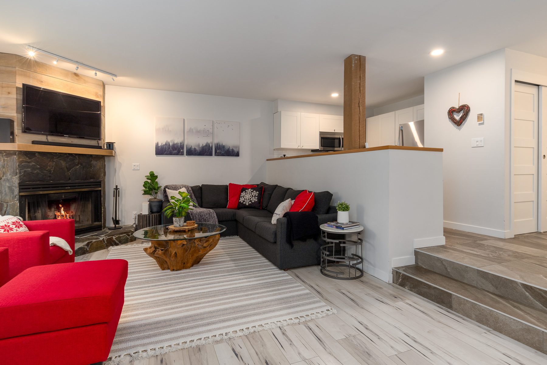 Great room with staircase and fireplace